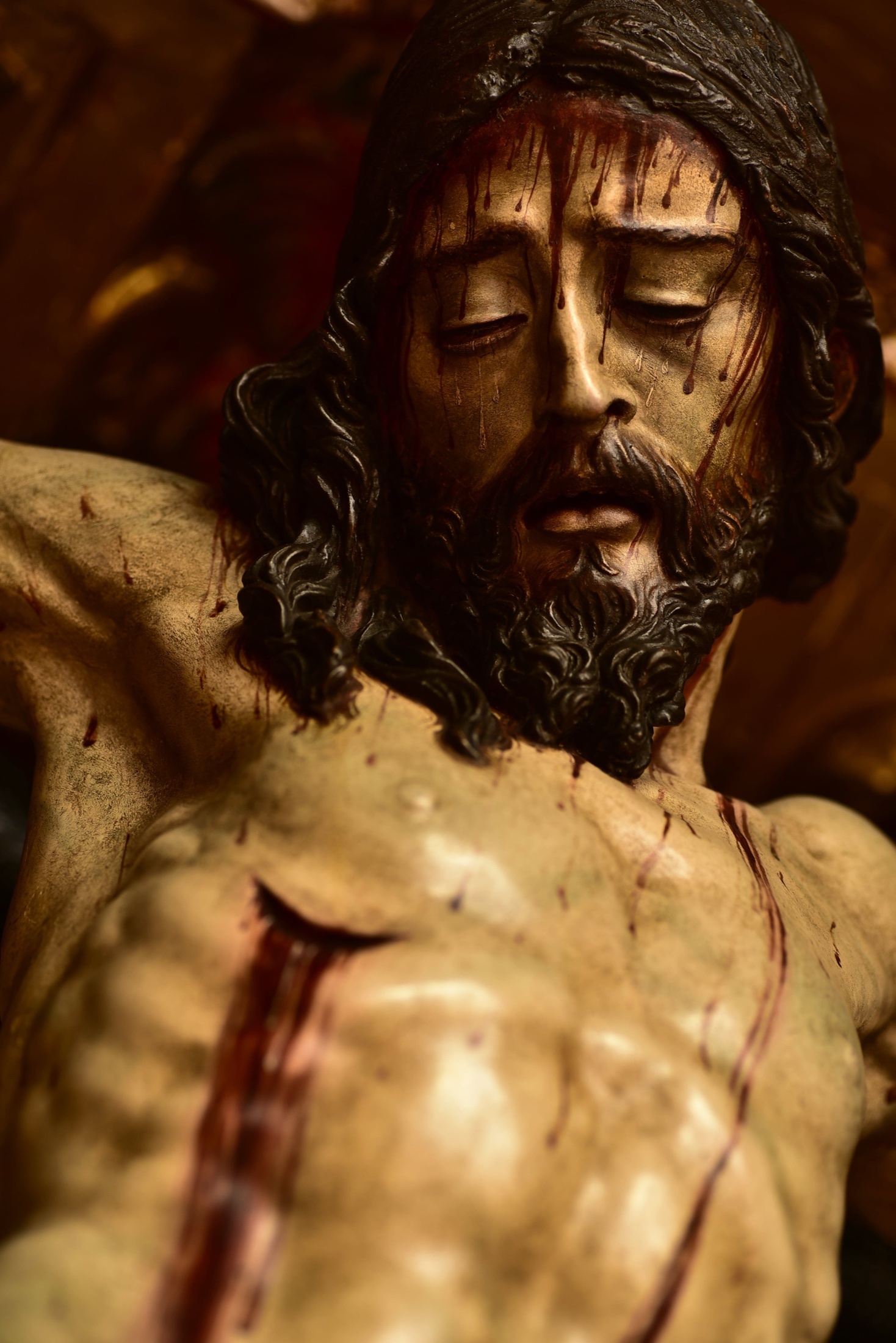 Detalle del rostro y el torso del Santísimo Cristo de la Misericordia
